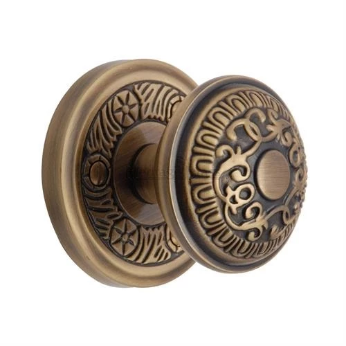 Classic brass door knob with filigree detailing. Centre door knob. Brass door handles UK